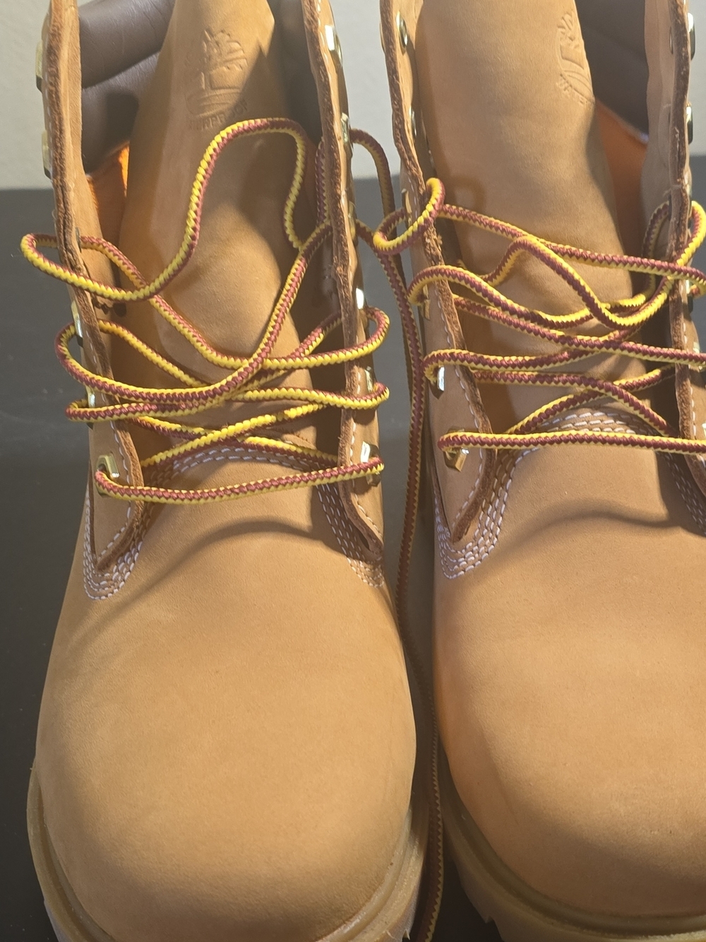 Timberland Wheat Lace-Up Boots with Yellow and Brown Accented Laces